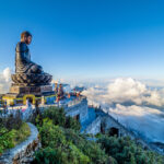 Landscape with
Giant Buddha statue on the top of mount Fansipan, Sapa region, Lao Cai, Vietnam