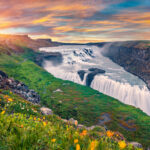 Wonderful summer view of popular tourist destination - Gullfoss waterfall. Spectacular sunrise on Hvita river. Gorgeous morning scene of Iceland, Europe. Traveling concept background.